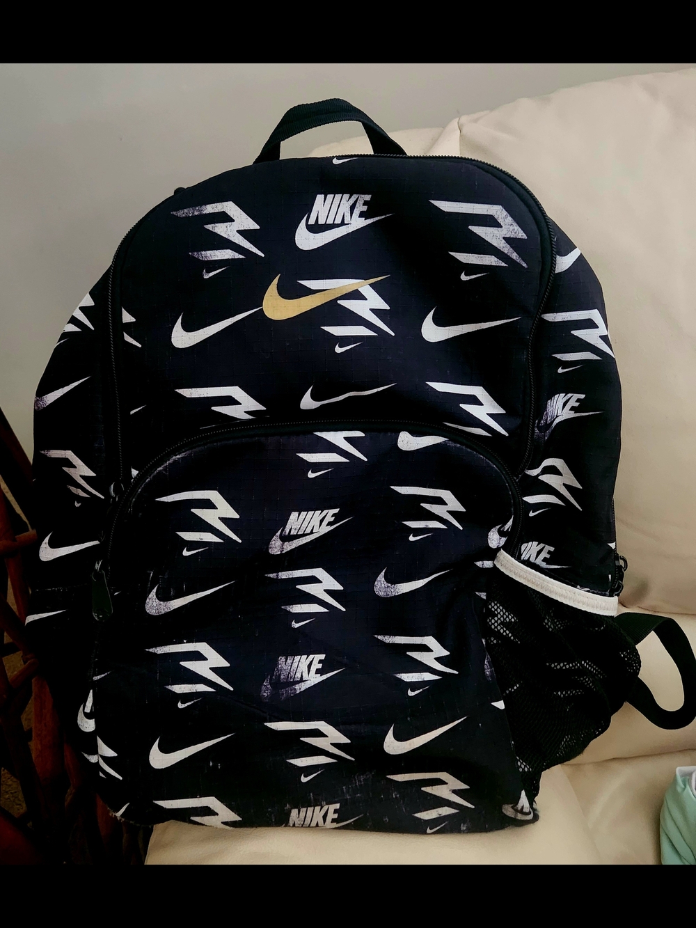 Nike Black Backpack with White Logos and Gold Swoosh